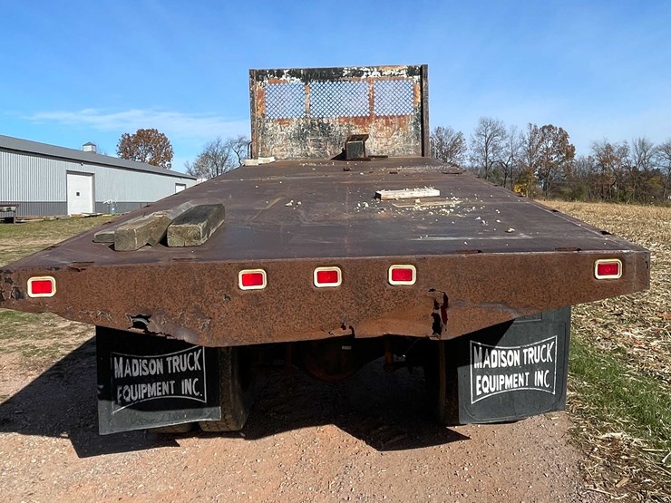 #3006-•-1999-chevy-c6500-single-axle-dump-flatbed-truck-(title-in-delay)-image-6