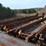 32'-4-strand-heavy-duty-infeed-log-deck-w/-#132-chain-w/-heavy-duty-drive-w/-steel-support-to-the-ground-image-6