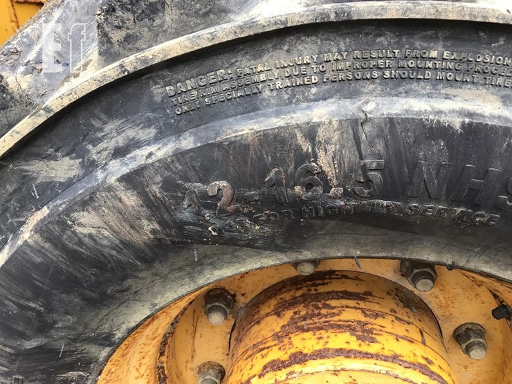 2004-deere-310g-image-25