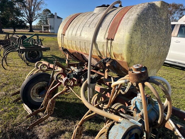 4-row-double-knife-rig-with-john-blue-piston-pump,-on-a-15’-x-3”-x-3”-bar-located-at-276-jonestown-road,-snow-hill-nc-call-252-531-8061-for-more-info.-image-1
