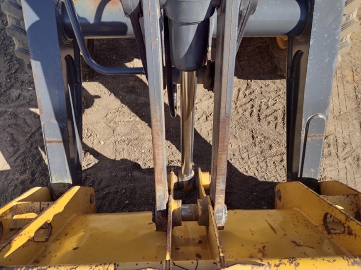 2009-deere-210lj-image-17