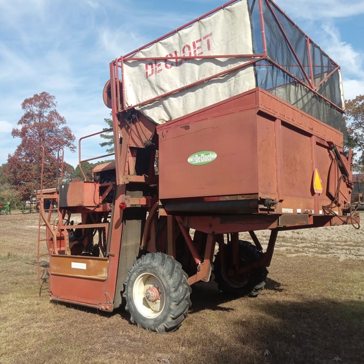 91 DECLOET TOBACCO HARVESTER WITH DEFOLIATERS AND CHAIN HEADS, PERKINS ENGINE; LOCATED AT 7112 MITCHELL MILL ROAD, ZEBULON, NC 27597, CALL 919.422.7441 WITH QUESTIONS.