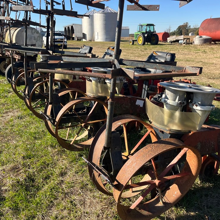 Mchanical 4 row carosel transplanter model 600, 42” rows, 4”x7” toolbar with row knockers, located at 700 Jonestown Rd Snow Hill NC, call 252-531-8061 for more info.