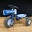 ol'-blue-toy-pedal-tricycle-image-1