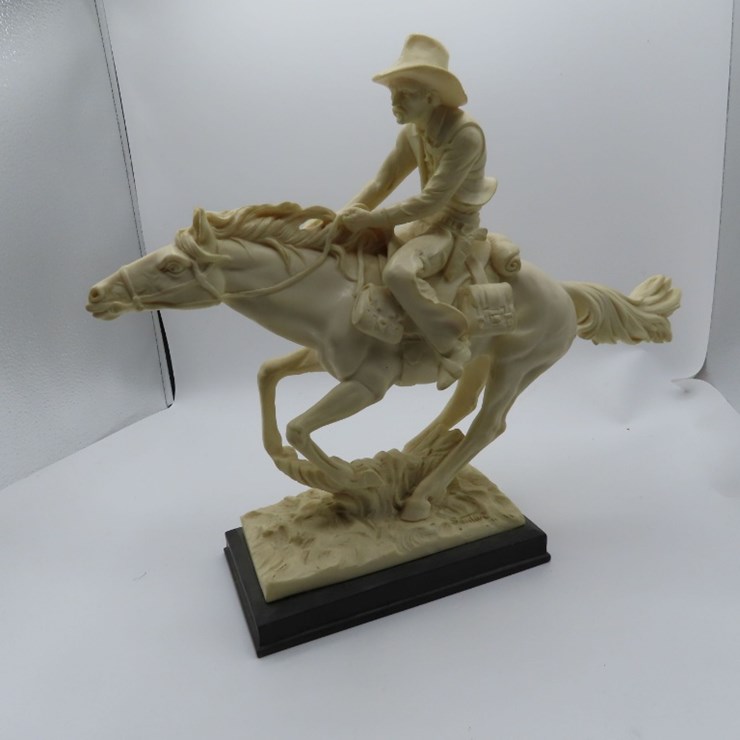 Pony Express Statue by FL. Santias. Classic Figures sticker on the bottom