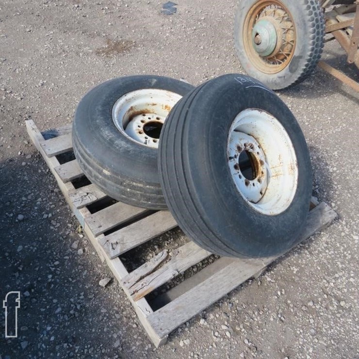 2 - 9.5 X 14 TIRES AND 6 BOLT RIMS