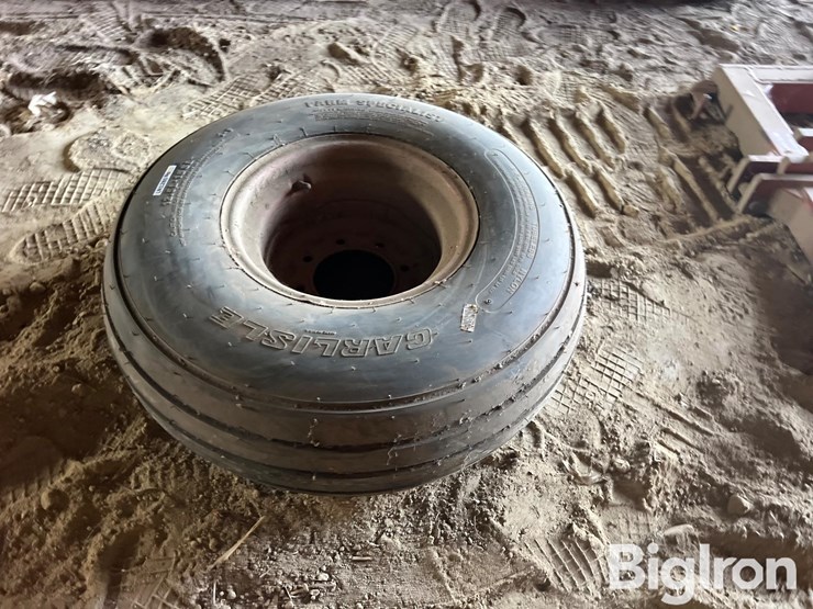 implement-12.5l-15sl-tire-&-rim-image-1