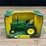 ertl-die-cast-replica-john-deere-4020-wide-front-tractor-1:16-scale-image-1