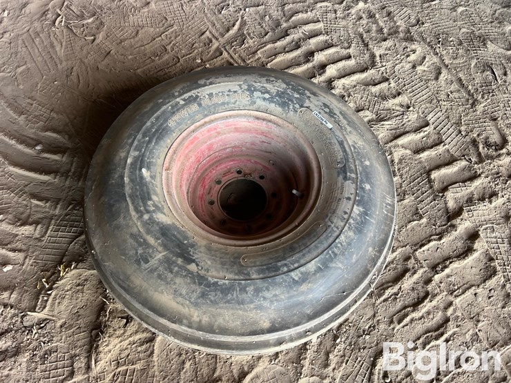 implement-10.00-16sl-tire-&-rim-image-1