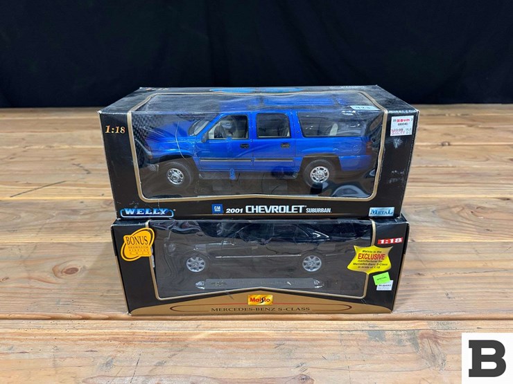 welly-replica-2001-chevrolet-suburban-1:18-scale,-maisto-replica-mercedes-benz-s-class-1:18-scale-image-1