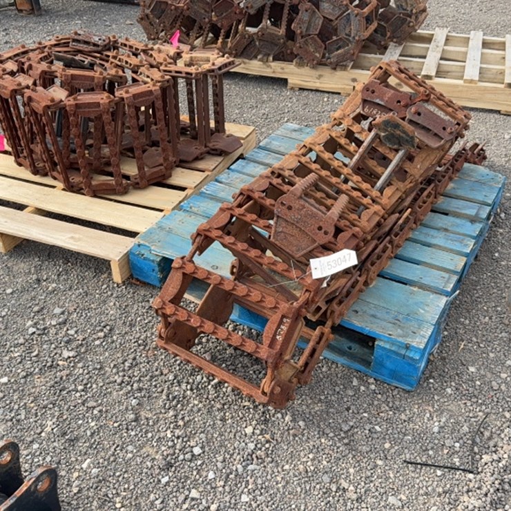 #2012 • SET OF STEEL SKID STEER TRACKS