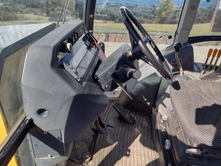 2009-deere-210lj-image-13