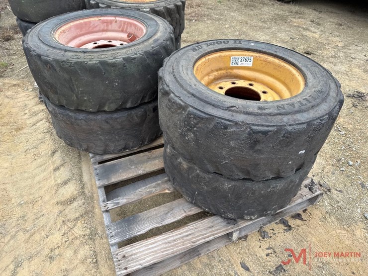 (4)-titan-hd-2000-10-16.5-nhs-tractor-tires-&-rims-image-1