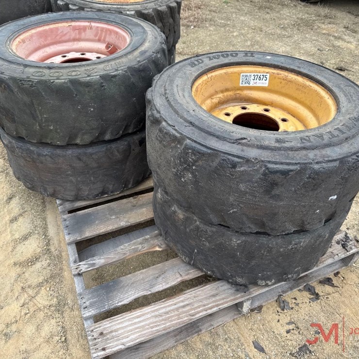 (4) TITAN HD 2000 10-16.5 NHS TRACTOR TIRES & RIMS