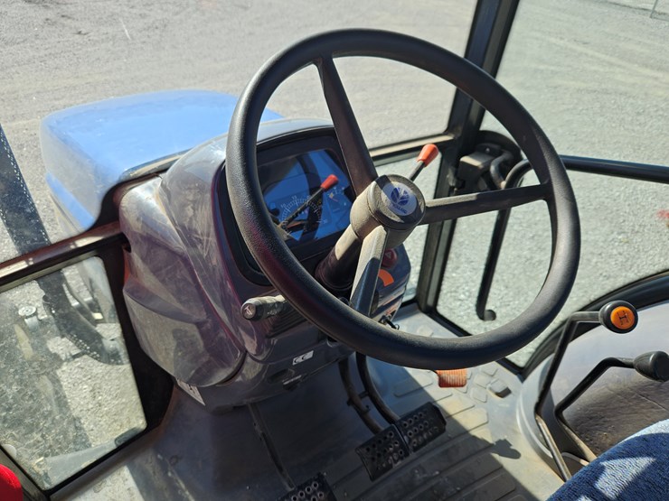 #203831-•-new-holland-td95-tractor-image-9