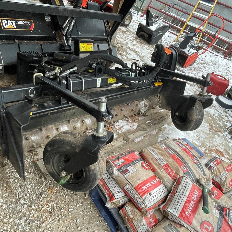 #2705 • CAT Skid Steer Power Rake (Fall Creek, WI)