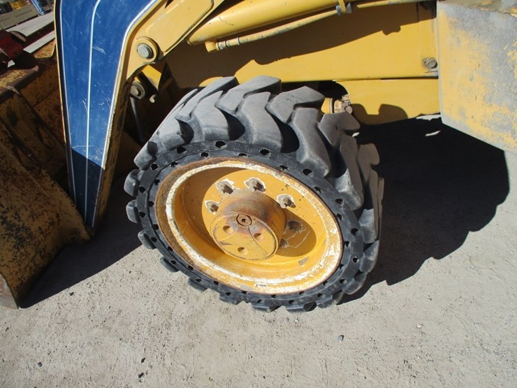 2004-deere-210le-image-18