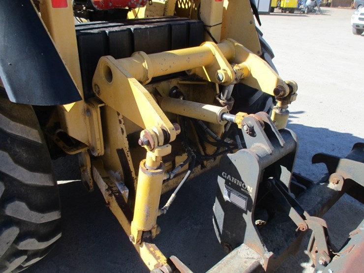 2004-deere-210le-image-12