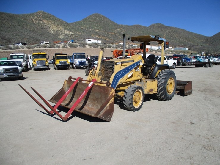 2004-deere-210le-image-1