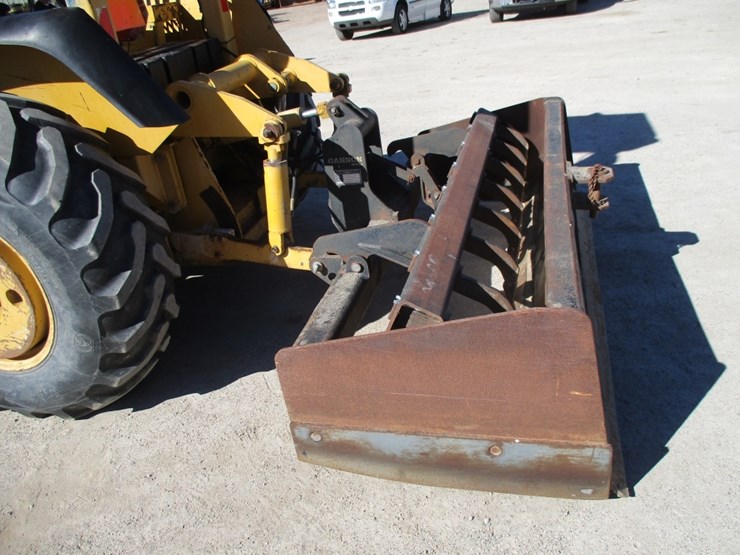 2004-deere-210le-image-11