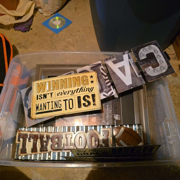 metal signs and framed picture