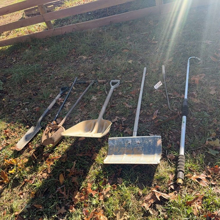 Yard tools, gutter cleaner, shovels, post hole digger.