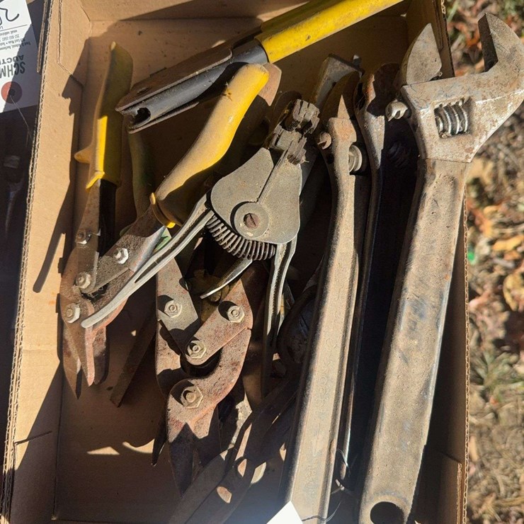 Cresent wrench, pliers, tin snips
