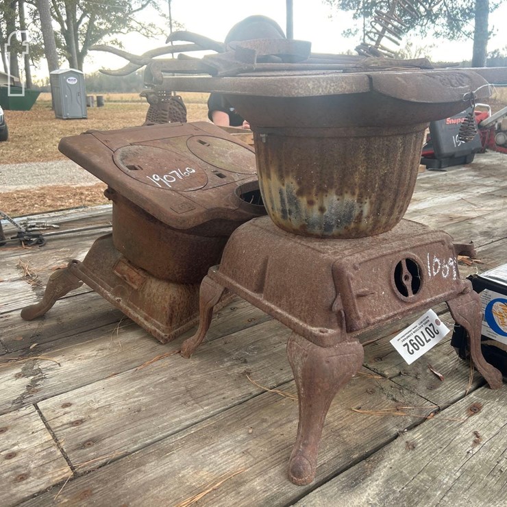 (2) CASE IRON POT BELLIE STOVES