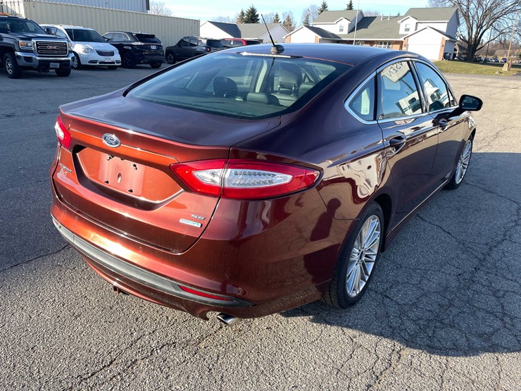 #1388-•-2015-ford-fusion-(has-wi-title)-(of)-image-4