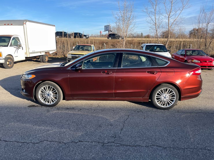 #1388-•-2015-ford-fusion-(has-wi-title)-(of)-image-7
