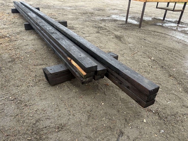 (8)-3”x6”-creosote-treated-beams,-(5)-are-approx-26’,-(3)-are-approx-28’,-at-farm-image-5