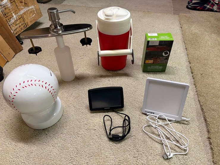 miscellaneous-lot:-igloo-water-cooler,-solar-led-umbrella-lights,-ucare-happy-light,-tom-tom-gps,-co-image-1