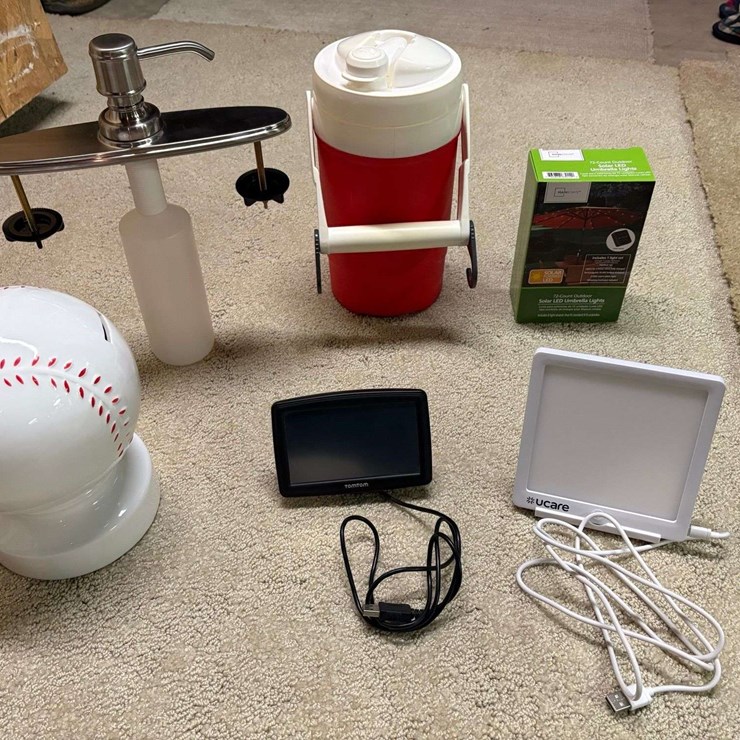 Miscellaneous Lot: Igloo Water Cooler, Solar LED Umbrella Lights, UCARE Happy Light, Tom Tom GPS, Co