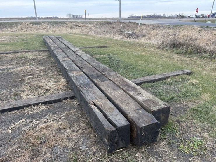 (3)-12”x12”-creosote-treated-wood-beams,-(2)-are-approx-34’,-(1)-is-approx-32’,-c-image-1
