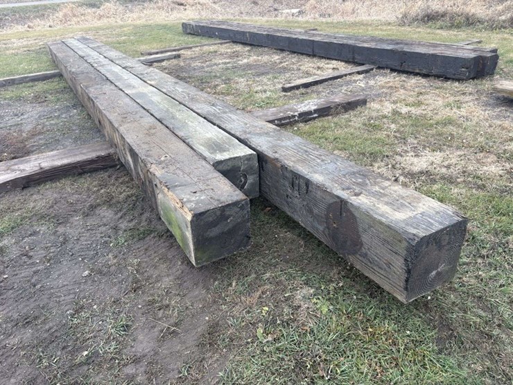(3)-13”x13”-creosote-treated-wood-beams,-(1)-is-approx-34’,-(1)-is-approx-32.5’,-(1)-is-approx-38’,-image-3