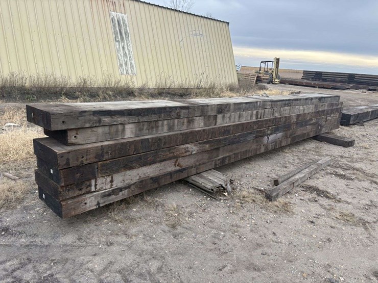 (6)-6”x19”-creosote-treated-wood-beams,-(4)-are-approx-26’,-(2)-are-approx-25’,-e-image-1
