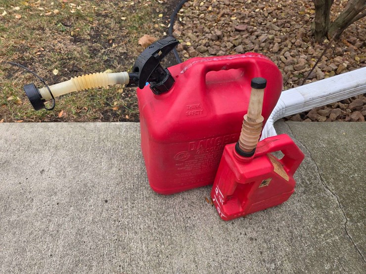 (2)-gas-cans,-buying-both-for-one-money-image-1