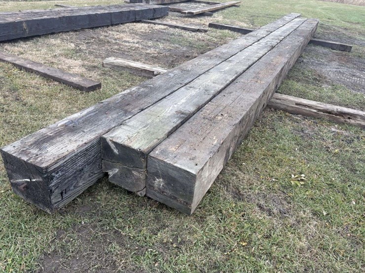 (3)-13”x13”-creosote-treated-wood-beams,-(1)-is-approx-34’,-(1)-is-approx-32.5’,-(1)-is-approx-38’,-image-2