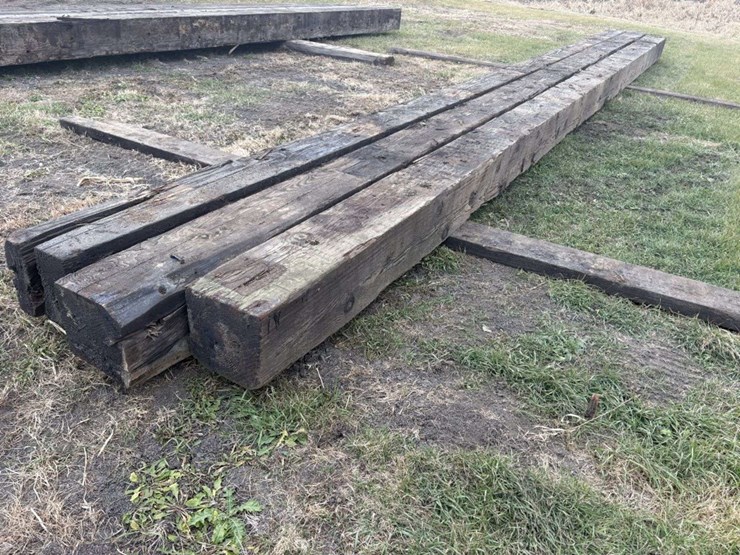 (3)-12”x12”-creosote-treated-wood-beams,-(2)-are-approx-34’,-(1)-is-approx-32’,-c-image-2