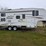 2004-prowler-fleetwood-5th-wheel-rv,-model-255-bhs,-12’-slide-out,-newer-19’-awning,-1-queen-front-b-image-2