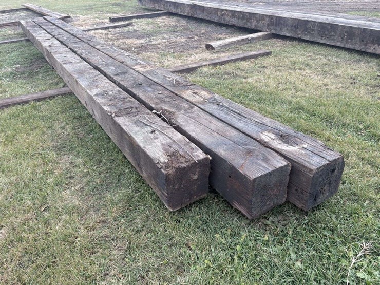 (3)-12”x12”-creosote-treated-wood-beams,-(2)-are-approx-34’,-(1)-is-approx-32’,-c-image-4