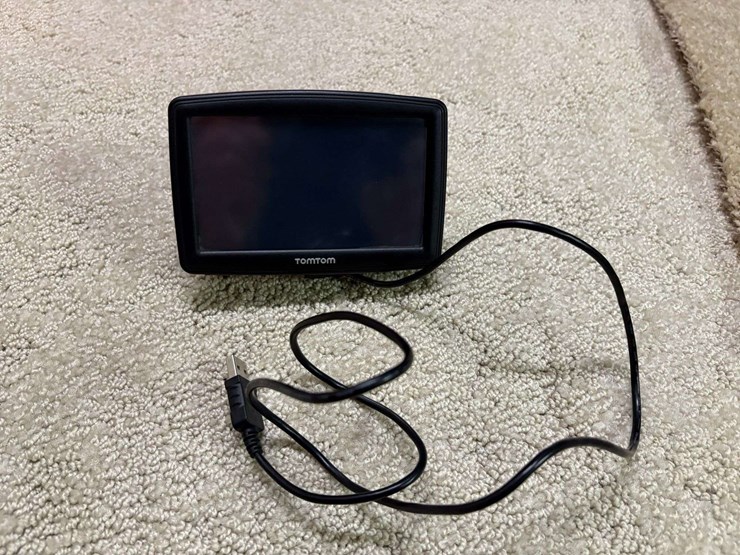 miscellaneous-lot:-igloo-water-cooler,-solar-led-umbrella-lights,-ucare-happy-light,-tom-tom-gps,-co-image-3