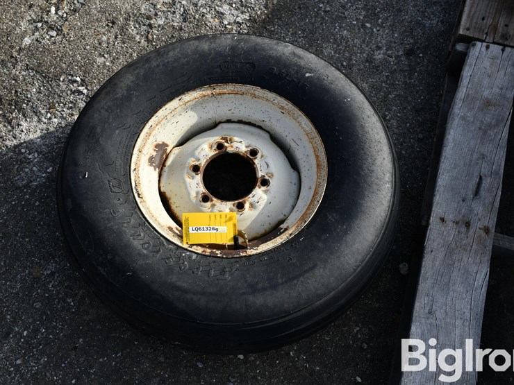 firestone-9.5l-15-tire-on-6-bolt-rim-image-1