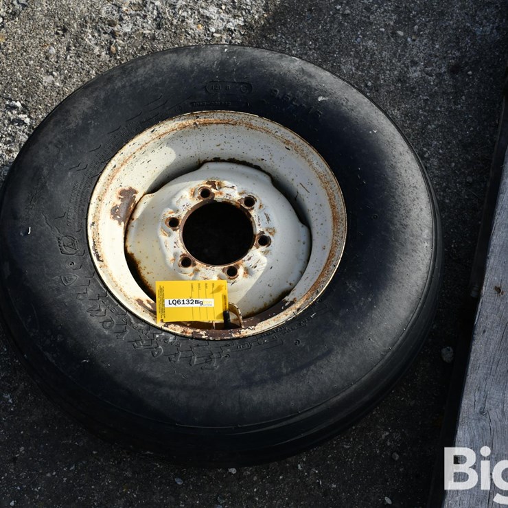 Firestone 9.5L-15 Tire On 6 Bolt Rim