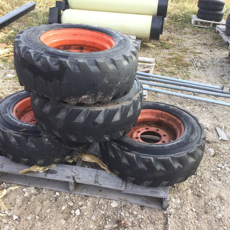 #4559 • (4) Skid Steer Tires and Wheels