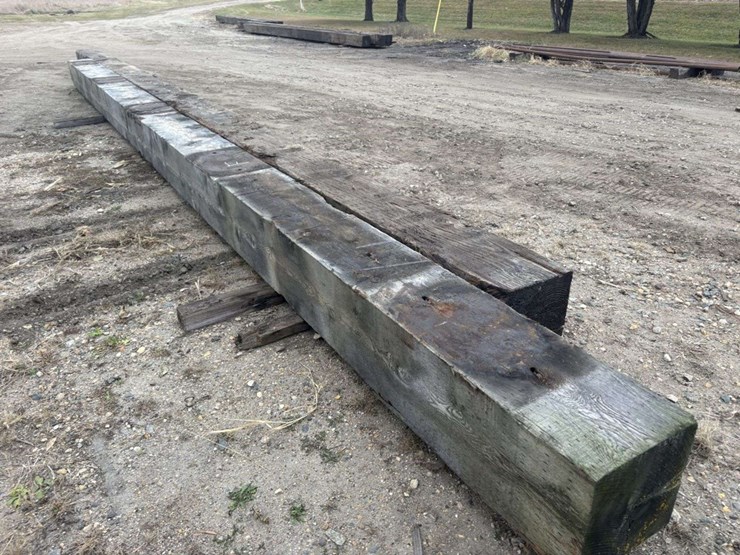 (2)-creosote-treated-wood-beams,-(1)-is-14”x14”x-38’-approx,-(1)-is-13”x14”x-32’-approx,-f-image-2