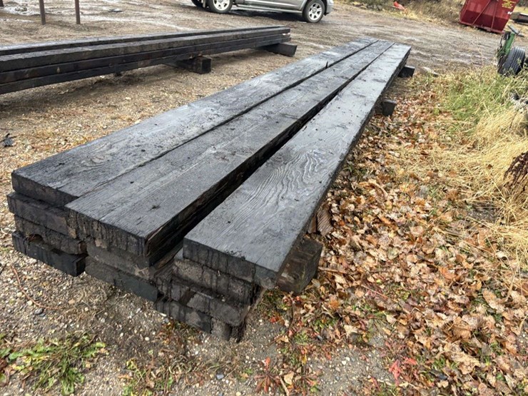 (12)-3x12”x26’-approx-creosote-treated-beams,-at-farm-image-5