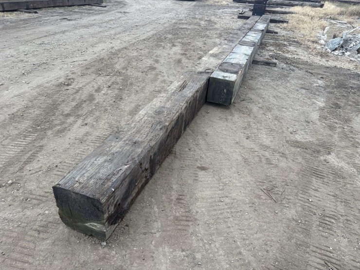 (2)-creosote-treated-wood-beams,-(1)-is-14”x14”x-38’-approx,-(1)-is-13”x14”x-32’-approx,-f-image-5