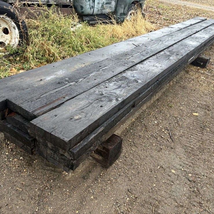 (12) 3x12”x26’ approx Creosote Treated Beams, at farm