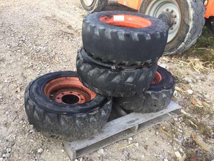 #4559-•-(4)-skid-steer-tires-and-wheels-image-2